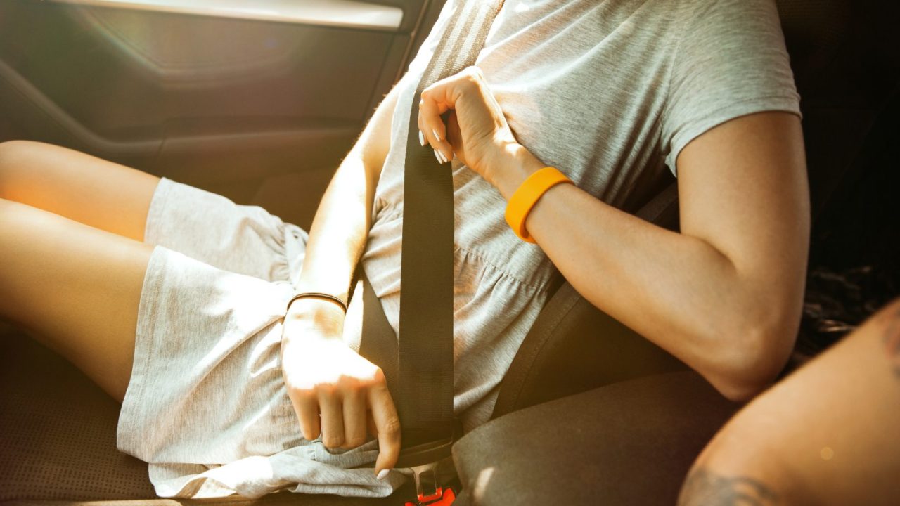 young-couple-preparing-vacation-trip-car-sunny-day