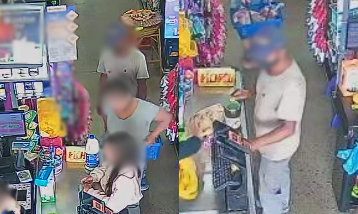 Imagem borrada mostra o falso pastor de piraquara dentro do supermercado, ao lado das meninas que foram perseguidas e abordadas por ele. Ele usa máscara e camiseta cinza.