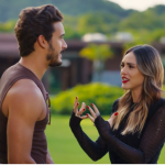 A imagem mostra Naiane conversando com João Raul no resumo de Coração Acelerado