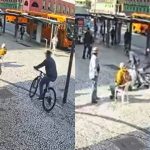 Sequência de imagens de câmera de segurança mostra homem tentando impedir um assalto praticado por um suspeito de bicicleta na Praça Rui Barbosa, no Centro de Curitiba.